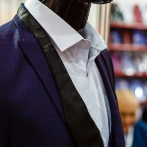 Suit in a showcase of a luxury store